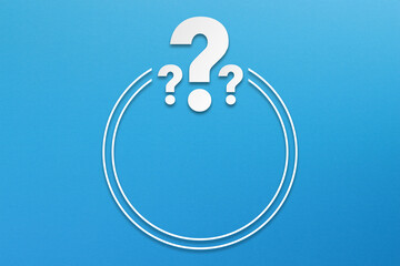 Question mark design with copy space on blue background	