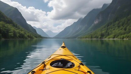 A kayak floating on a serene lake surrounded by lush mountains and cloudy skies