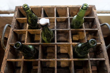 vintage bottles in a wooden box