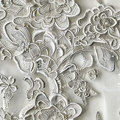 Seamless pattern of floral silver white embroidery on white velvet