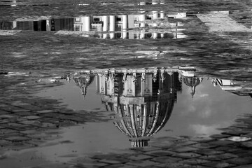 st. Peter basilica reflected in a paddle in black and white