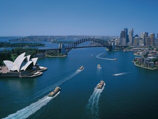 Aerial view of Sydney Harbor with Sydney Opera House and Harbour Bridge.