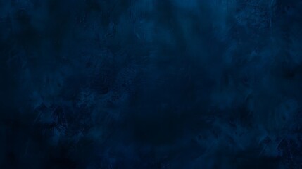 A dark blue textured abstract background suitable for a variety of creative designs and layouts.