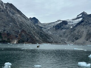 icebergs and glaciers on ocean in greenland