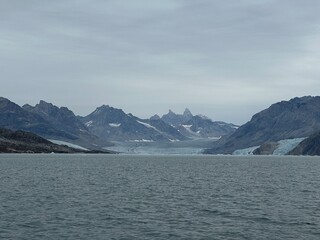 icebergs and glaciers on ocean in greenland