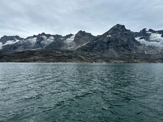 icebergs and glaciers on ocean in greenland