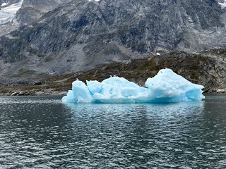 icebergs and glaciers on ocean in greenland