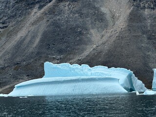 arctic icebergs on ocean in Greenland