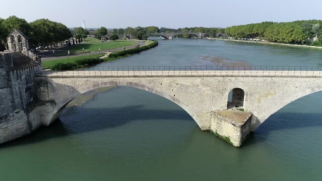 Aerial drone view of Saint B&eacute;n&eacute;zet also known as Pont d'Avignon is a famous medieval bridge over the Rhone in the town of Avignon in southern France and a popular tourist attration 4k high resolution