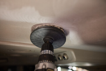 Carwash service, cleaning of car ceiling covering