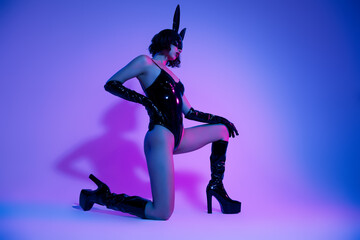 Photo of girl feel tempting sit posing wear rabbit costume bodysuit isolated neon color background