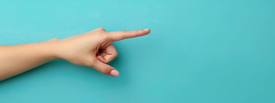 Light Skin Hand Pointing Right on Turquoise Background Expressive Gesture