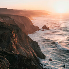 Panoramic sunset view of a rugged, rocky coastline, sea, ocean view.