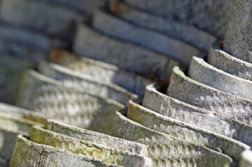 Stack of asbestos roofing sheets. Carcinogenic eternite.