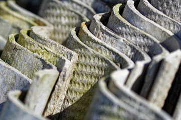 Stack of asbestos roofing sheets. Carcinogenic eternite.
