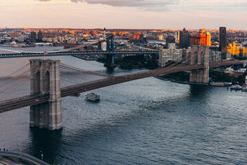 View of Brooklyn Bridge and Manhattan Bridge seen from the East River in New York City, United...