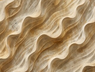 Wavy patterns in sand evoke a sense of rhythm and natural flow, perfect for backgrounds or abstract concepts.