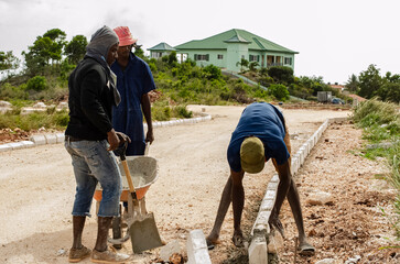 Men Working On Curve Wall