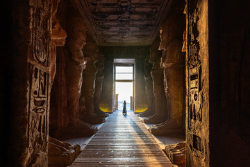 Sunrise in the long gallery of the temple of Abu Simbel, Egypt