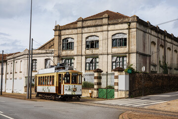 Naklejka premium old street in the old town with an old tranvia