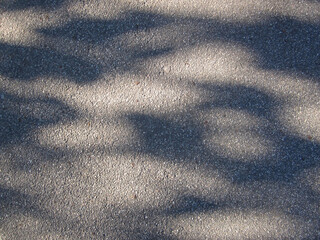 Light and shadow asphalt background top view