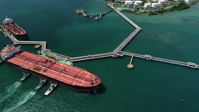 Aerial view of cargo ship on Water Terminal Madre de Deus, intended for receiving oil and shipping petroleum derivatives processed by the Mataripe Refinery. - Madre de Deus, Bahia, Brazil 