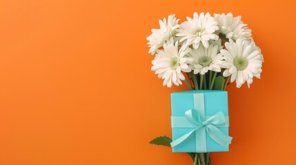 Beautiful white gerbera daisies bouquet flowers with gift box on orange background. AI generated