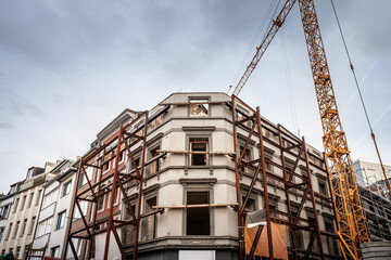 Selective blur on a construction site of a reconstruction of a historical building keeping the original style in germany, in the city center of Aachen, Altstadt or Mitte.