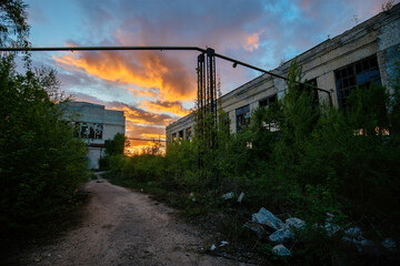Old abandoned industrial area waiting for demolition at sunset