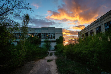 Old abandoned industrial area waiting for demolition at sunset