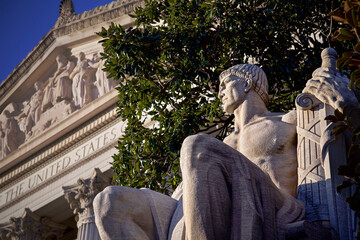 statue in front of US government building in Washington DC - Powered by Adobe