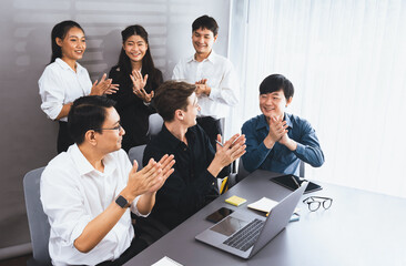 Diverse group of office worker and employee applauding, happily collaborate on strategic business...