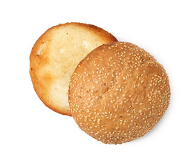 Halves of grilled burger bun isolated on white, top view