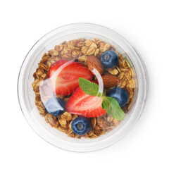 Tasty granola with berries, nuts and yogurt in plastic cup isolated on white, top view