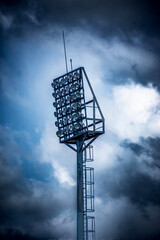 Stadium lights with dramatic sky background. This image is suitable for a variety of projects