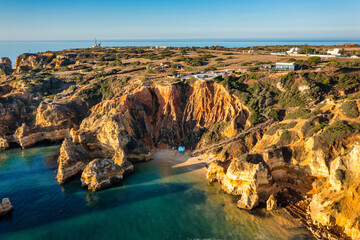 Camilo beach (Praia do Camilo) in Lagos, Algarve, Portugal. Wooden footbridge to the beach Praia do...