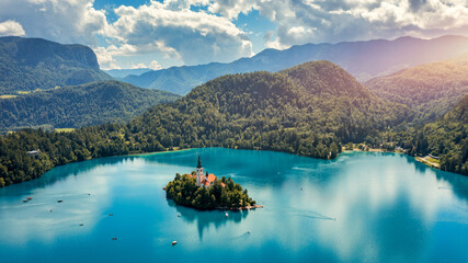 Lake Bled in Slovenia. Beautiful mountains and Bled lake with small Pilgrimage Church. Bled lake and island with Pilgrimage Church of the Assumption of Maria. Bled, Slovenia, Europe.