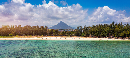 Beach of Flic en Flac with beautiful peaks in the background, Mauritius. Beautiful Mauritius Island...