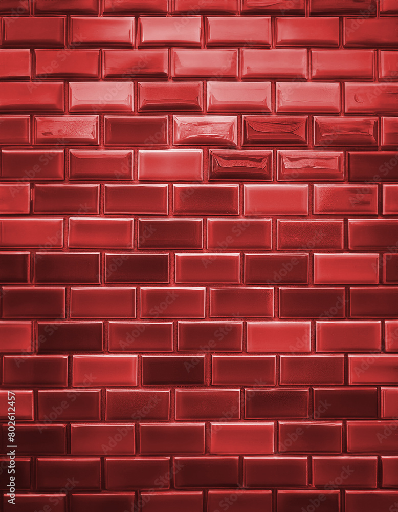 Poster close-up of a vibrant red brick wall with a glossy finish. the light reflections highlight the textu