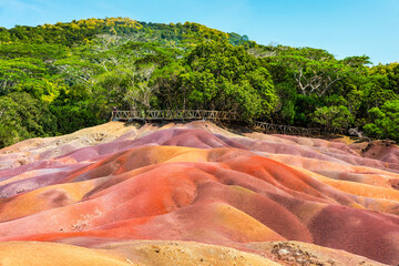 Chamarel Seven Colored Earth Geopark in Mauritius Island. Colorful panoramic landscape about this volcanic geological formation Chamarel Seven Colored Earth Geopark in Riviere noire district.