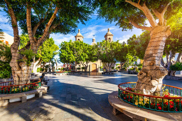 Naklejka premium Aguimes town in Gran Canaria, Canary Islands, Spain. Historic centre of Aguimes (Gran Canaria). Typical traditional street of the Canary Islands. Colourful town of Aguimes, Gran Canaria, Spain.
