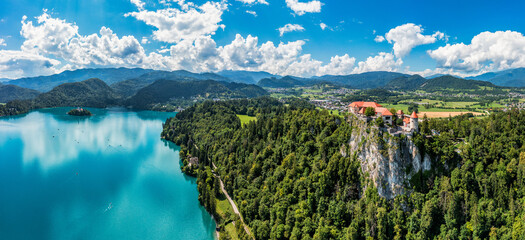 Bled, Slovenia, aerial view of beautiful Bled Castle (Blejski Grad) with Lake Bled (Blejsko Jezero), the Church of the Assumption of Maria on a bright summer day. Bled, Slovenia.