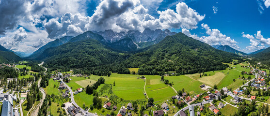 Gozd Martuljek town in Slovenia at summer with beautiful nature and mountains in the background....