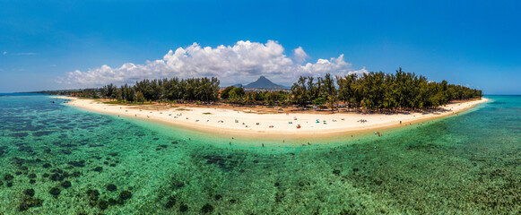 Beautiful Mauritius island with beach Flic en flac. Coral reef around tropical palm beach, Flic en...