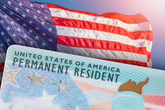 Green Card US Permanent resident card. Immigrant ID documents. USA Electronic Diversity Visa Lottery DV-2024 DV Lottery Results. United States of America. American flag on background