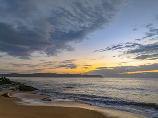 Fototapeta premium After the rain sunrise at the seaside