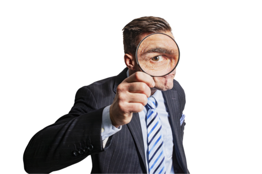 Funny man businessman man with a magnifying glass in his hand