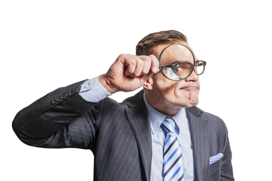 Funny man businessman man with a magnifying glass in his hand