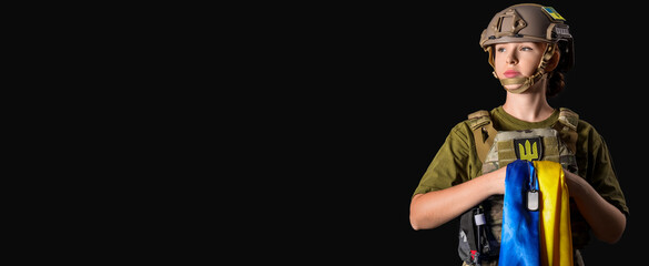 Young female soldier with flag of Ukraine and military tag on dark background
