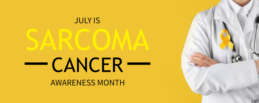 Doctor with yellow ribbon on robe against color background. Cancer awareness concept